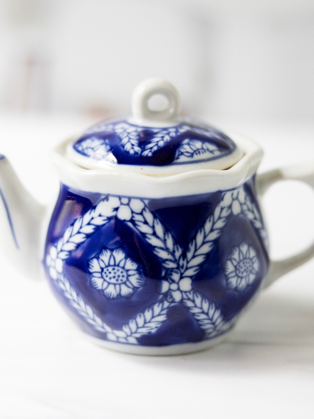 Vintage blue white Asian small teapot leaf and flower design 4" tall